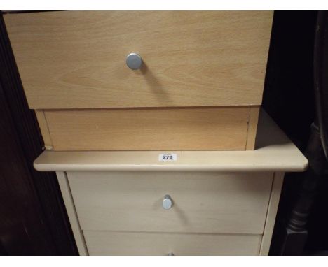 2 light beech effect bedside chests 