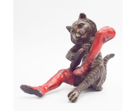 Cold painted bronze model of Puss in Boots depicting a cat polishing his boots 8cm tall 