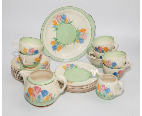1930's Clarice Cliff tea service, hand painted Crocus design comprising 24 pieces   Condition - there is some wear to the cen