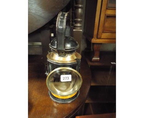 Old tin and brass railway lamp 