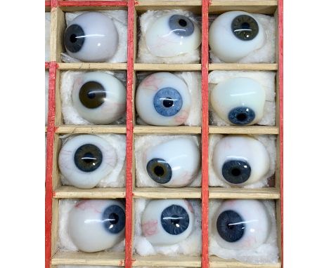 Collection of 12 vintage prosthetic glass eyes 
