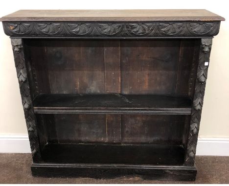 Carved Oak 2 shelf bookcase measures approx 46"Heigh by 47"Wide by 12"depth 