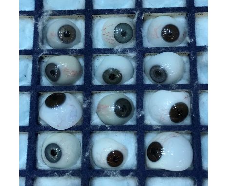Collection of 12 vintage prosthetic glass eyes 