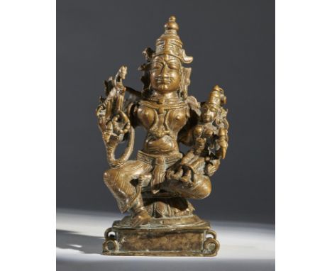 Indian Art A bronze group depicting UmamahesvaraSouthern India, 17th century . . Cm 12,00 x 21,00 x 11,00. Provenance: Privat