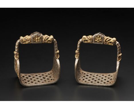 Himalayan Art A pair of stirrups Tibet, 12th-14th century . . Cm 12,50 x 15,70. Rare and significant pair of Tibetan or Mongo