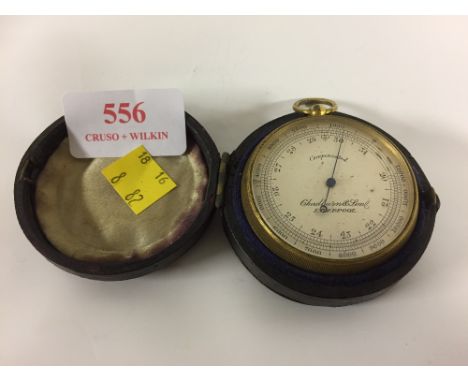 CHADBURN & SON, LIVRPOOL BRASS POCKET TURNED BAROMETER IN ORIGINAL CASE