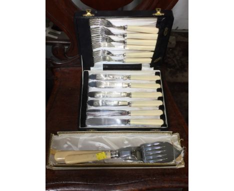 BOXED SET OF FISH KNIVES AND FORKS AND LARGE FISH KNIFE AND FORK