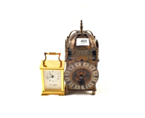 An eight day lantern clock and quartz carriage clock