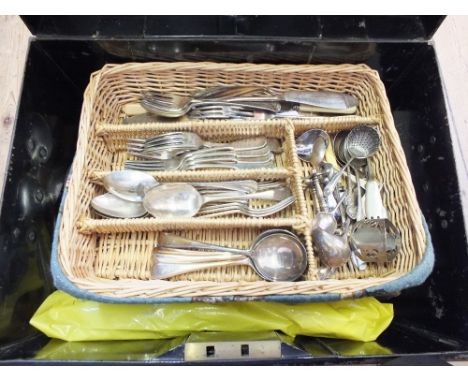A tin trunk of various Silver plated cutlery