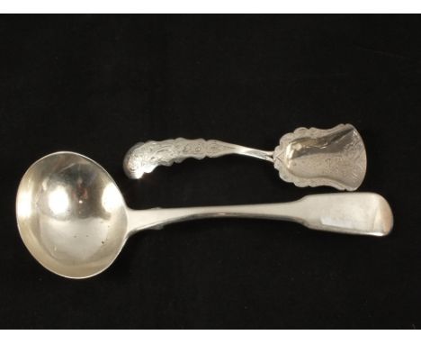 A Georgian Silver sauce ladle and an engraved shovel shaped caddy spoon, mark JS