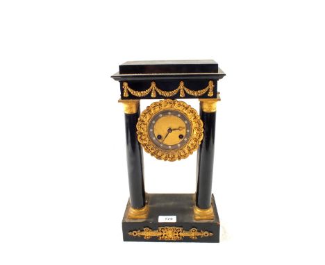 A 19th Century French ebonised Portico clock with gilt metal appliques 