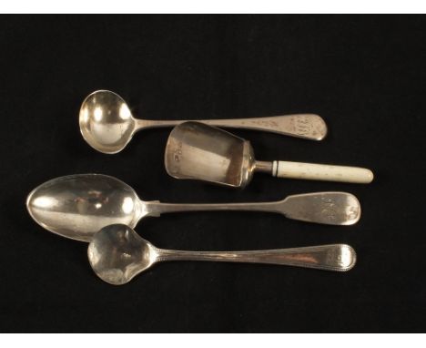 A Georgian Silver scoop shaped caddy spoon and three Georgian spoons