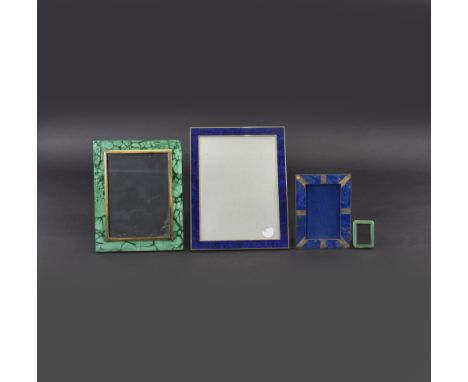 Konvolut von vier Fotorahmen20. Jhdt.H. 6-27 cmMetall, emailliert, bez. PUIFORCAT. Silber mit Lapislazuli. Metall mit Stein u