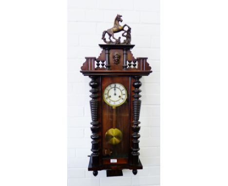 Vienna mahogany framed wall clock with carved horse finial to top, 100cm long 
