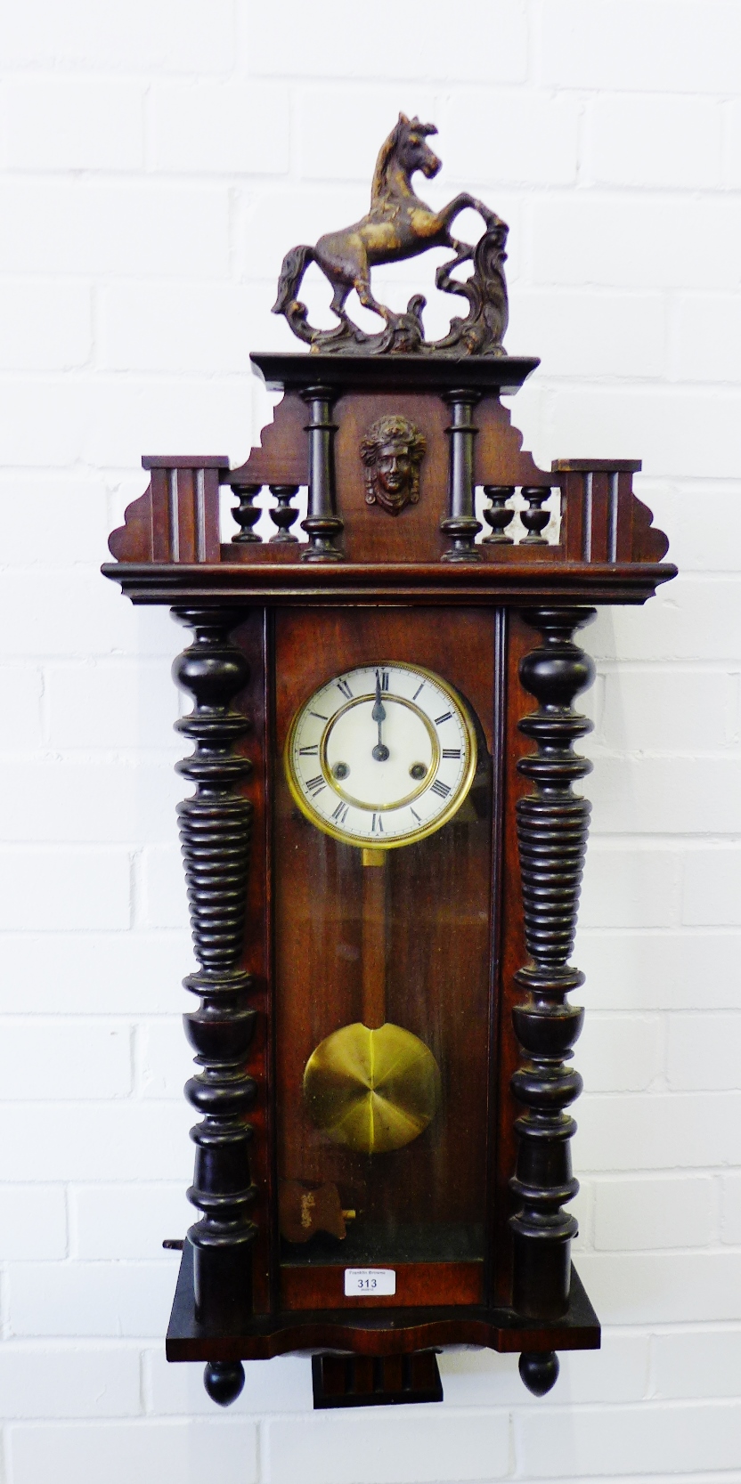 Vienna mahogany framed wall clock with carved horse finial to top