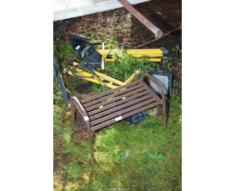 Three 240 volt halogen work lamps and a metal caravan step.