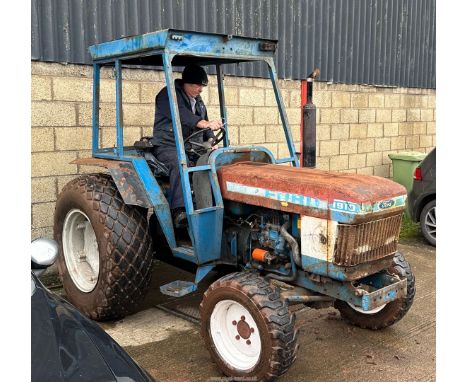 A Ford 1910 4 WD three cylinder 1,702 cc Diesel engined 32 H.P. compact farm tractor. Registration no. A 867 DDP, first regis