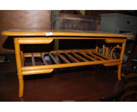 A coffee table with lower shelf, 42" x 22" x 18" high.