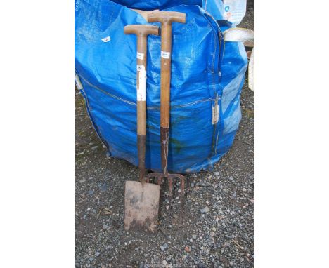 A garden fork and spade.