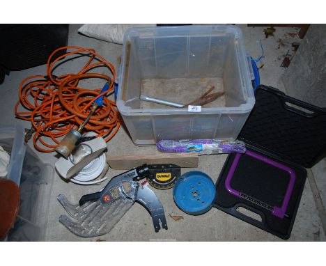 A roll of 240 v cable, LPG blow torch with pipe, hole saw, lump hammers, etc.