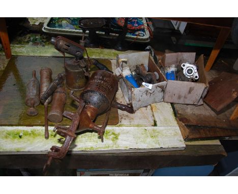 A brake caliper part, grease guns, blow lamp, etc., hand operated mixer, etc.