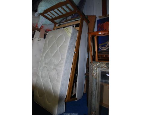 A single Pine framed bed with two under-bed roller drawers plus a mattress, 38 1/2" x 79".
