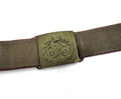 A Victorian army officer's belt, the rectangular clasp with VR cypher and crown with oakleaf wreath, the belt with all-over s