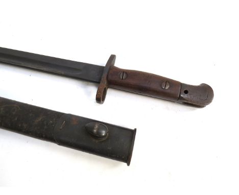 A 1907 Remington bayonet with 9/17 date, with leather and steel scabbard 