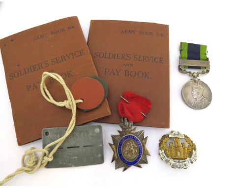 A WWII and earlier POW collection relating to 6030423 ERNEST REYNOLDS of the Essex Regiment who served in the North West Euro