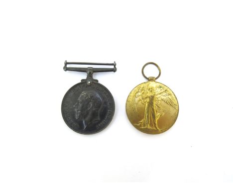 A WWI British pair of medals named to 300082 PTE. W. BARBER R. WAR. R.