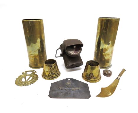 A quantity of military collectables including bicycle lamp and trench art ashtrays etc