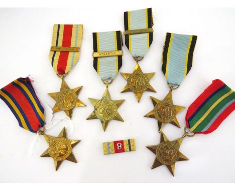 Six WWII and copied star medals including three Air Crew Europe star copies and original Africa star with 8th Army clasp