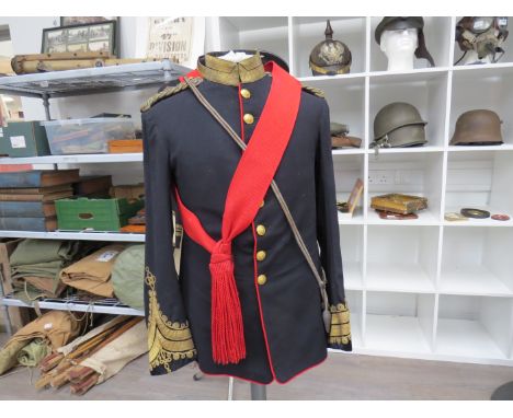 A Victorian Army Medical Staff officer's tunic, black cloth with red piping, gold thread cuffs and collar detail