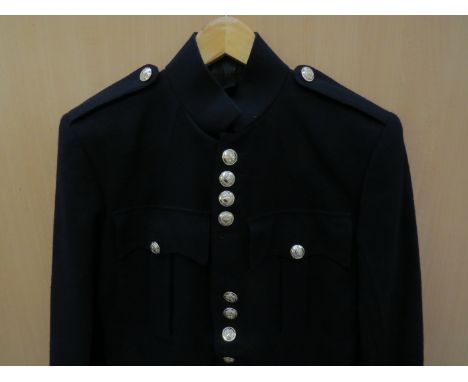 A post war Welsh Regiment NCO's dress uniform jacket with trousers