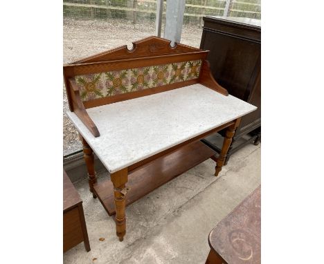 A VICTORIAN SATINWOOD AND PITCH PINE MARBLE TOP WASHSTAND WITH TILE BACK, 42" WIDE 