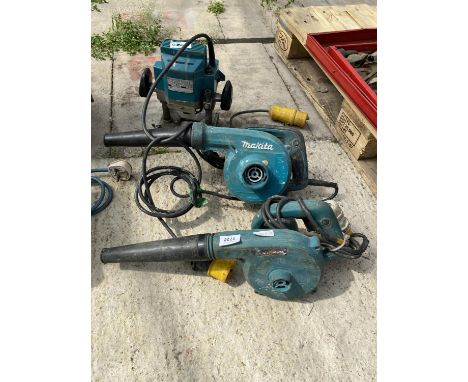 AN ASSORTMENT OF POWER TOOLS TO INCLUDE A ROUTER AND TWO MAKITA VACUUMS 