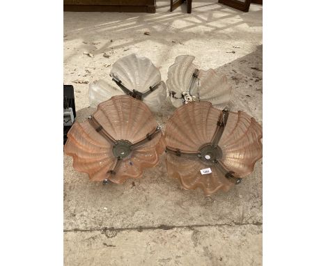 A GROUP OF FOUR HANGING LIGHT SHADES 