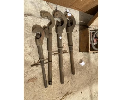 A SET OF FOUR VINTAGE PIPE CUTTERS 