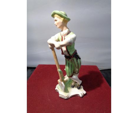 A WEDGEWOOD FIGURINE OF A GARDNER 