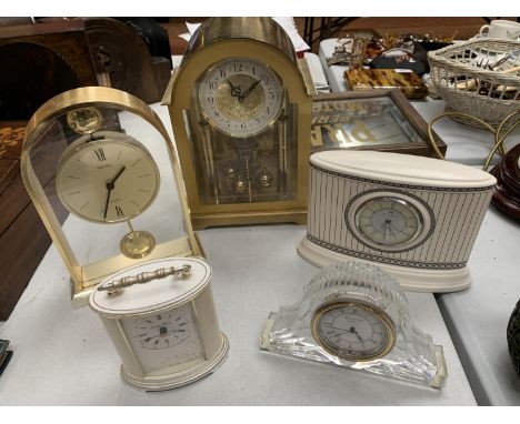 A COLLECTION OF FIVE MANTEL CLOCKS TO INCLUDE A HOWARD &amp; MILLER ANNIVERSARY CLOCK, A WEDGWOOD "CONTRASTS" AND A WATERFORD
