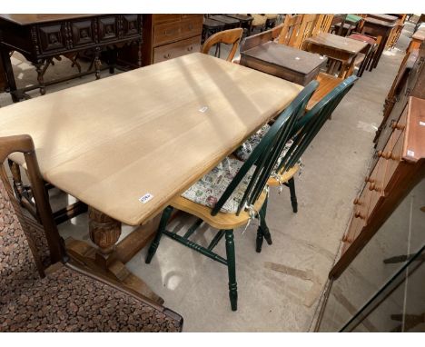 A LIGHT OAK REFECTORY STYLE DINING TABLE AND PAIR OF WINDSOR STYLE CHAIRS 