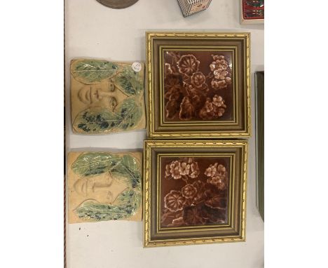 A PAIR OF FRAMED CERAMIC TILES AND A PAIR OF HAND CRAFTED TILES WITH GLAZED LEAF DETAIL 