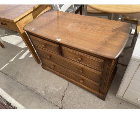 AN ERCOL ELM CHEST OF TWO SHORT AND TWO LONG DRAWERS, 40" WIDE 