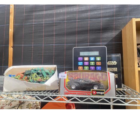 AN ASSORTMENT OF ITEMS TO INCLUDE A BURAGO LAMBORGHINI, STAR WARS VHS AND ARMY FIGURES 