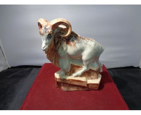 A LARGE WEDGEWOOD FIGURINE OF A MOUNTAIN GOAT 