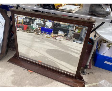 A WOODEN FRAMED BEVELED EDGE OVER MANTEL MIRROR 