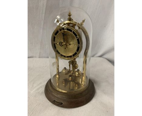 A GLASS DOMED 'SCHATZ' ANNIVERSARY CLOCK 