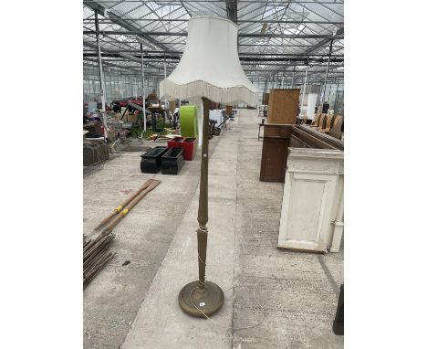 A 20TH CENTURY STANDARD LAMP WITH SHADE 