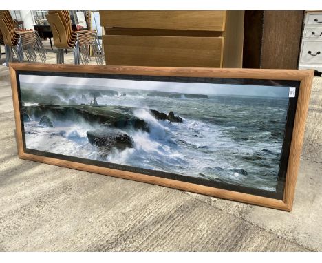 A LARGE WOODEN FRAMED PRINT OF A CLIFF SCENE 