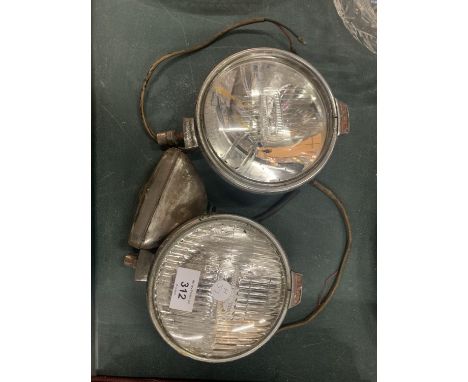 A PAIR OF VINTAGE LUCAS CAR HEADLIGHTS TO ALSO INCLUDE AN INDICATOR LAMP 